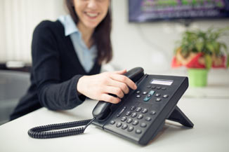 Answering phone with cloud PBX system service.